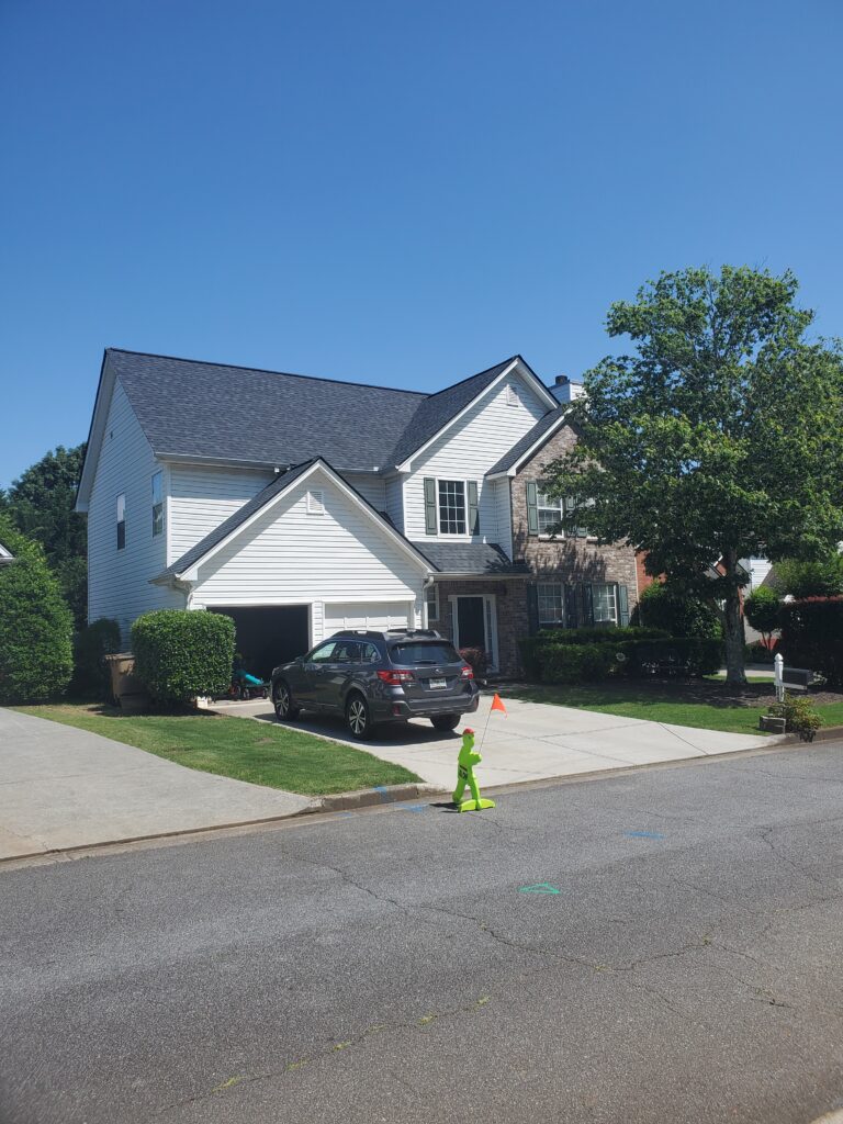 House in Kennesaw, GA with healthy trees during summer